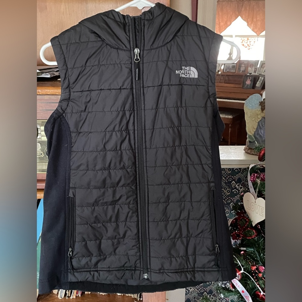 Black hooded vest
